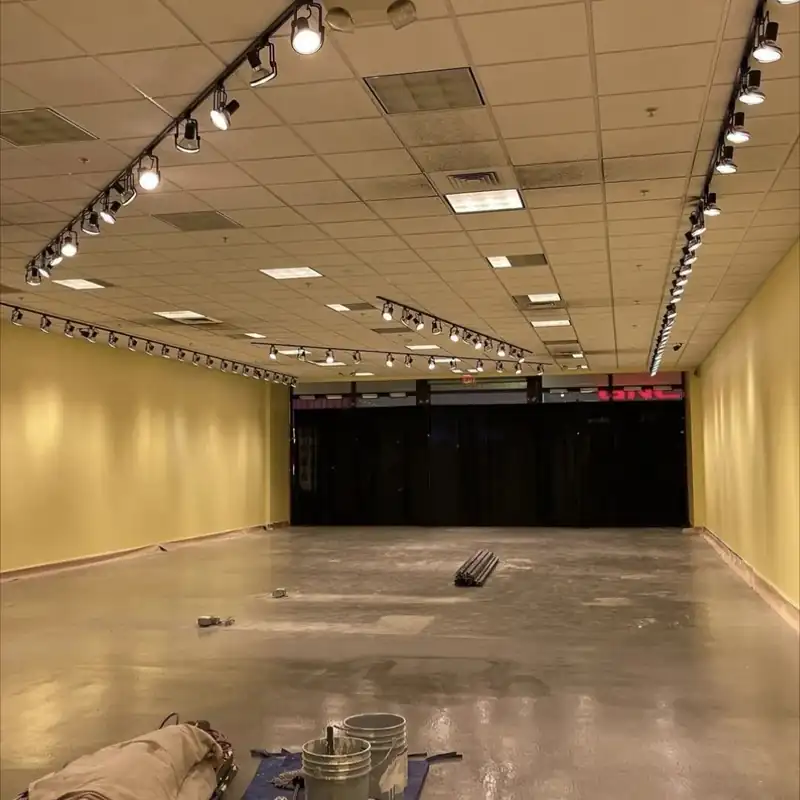 Retail interior with freshly painted yellow walls