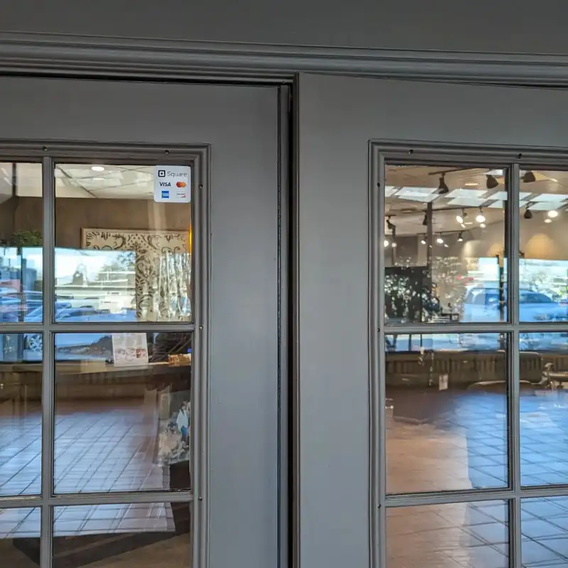 Commercial storefront door frames painted grey